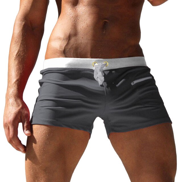 Men Board Shorts Solid Color Swimming Trunks Drawstring Pockets Slim Fitted Beach Shorts Swimwear